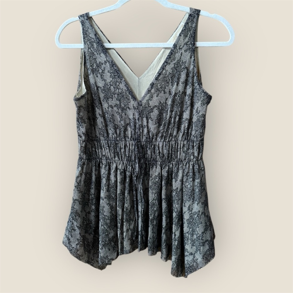 Michael Kors black and nude sleeveless blouse with an asymmetrical hem size P
